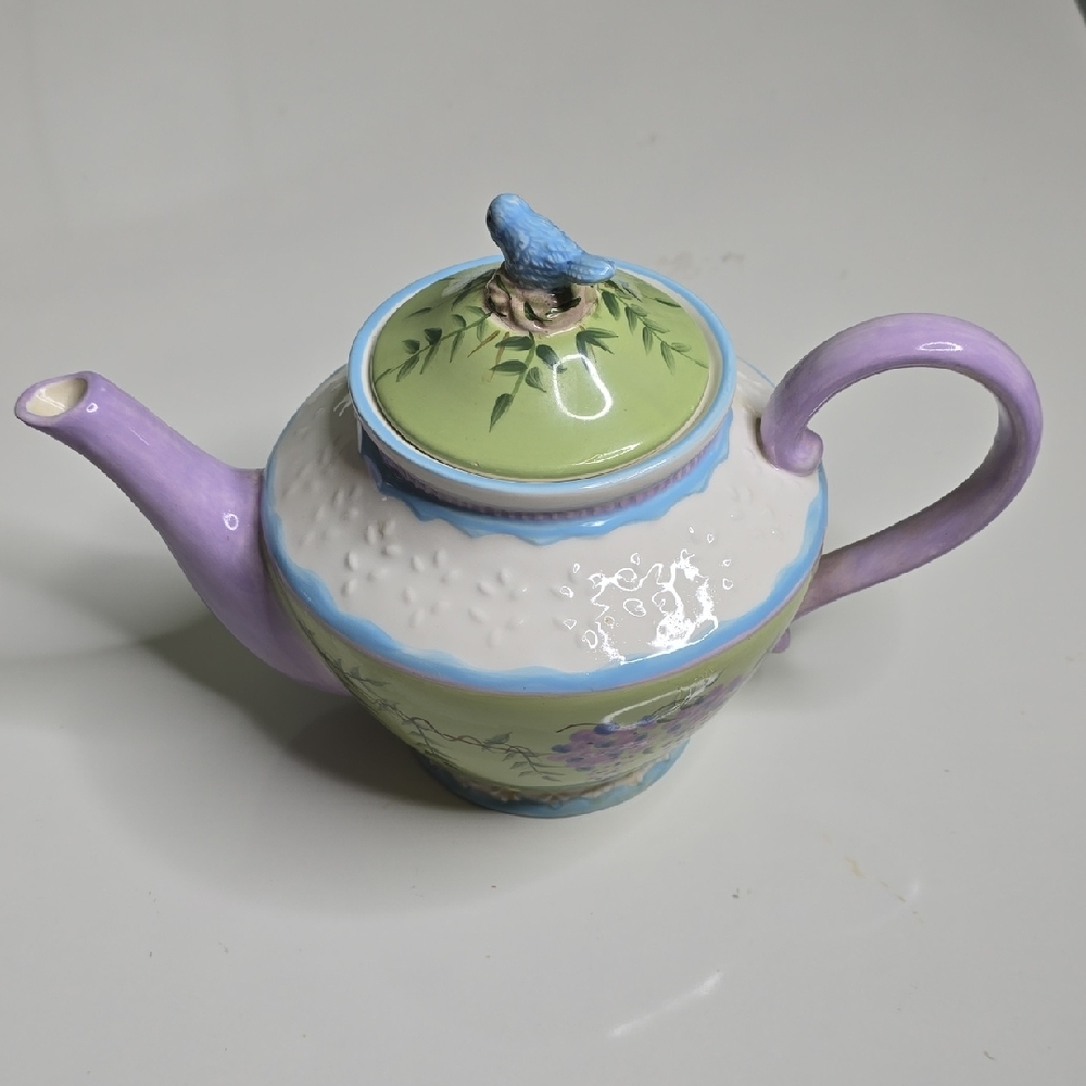 Elegant Ceramic Teapot with Bird Design